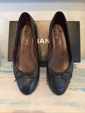 CHANEL Black Quilted Leather CC Bow Flats